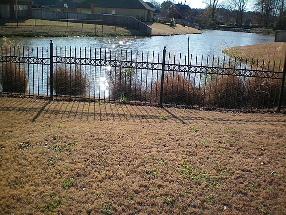 Watch the ducks swim by from your Pergola on the back patio