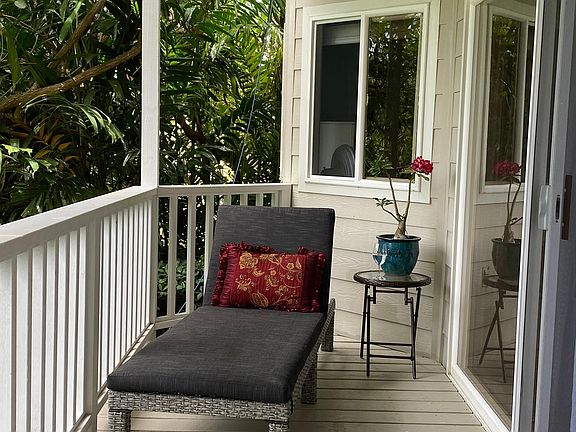 Relax on your private deck overlooking the garden.