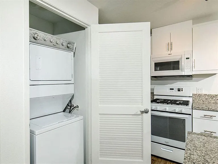 Washer and dryer on the side of the refrigerator