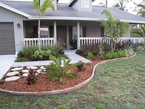 Exterior - Recently painted with new landscaping and automatic sprinklers.