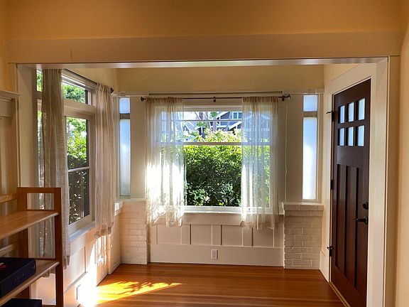 Living Area; Ample natural light and privacy; hardwood floors