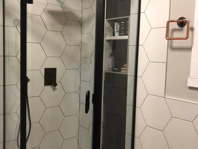 Shower with rain head, body spray.