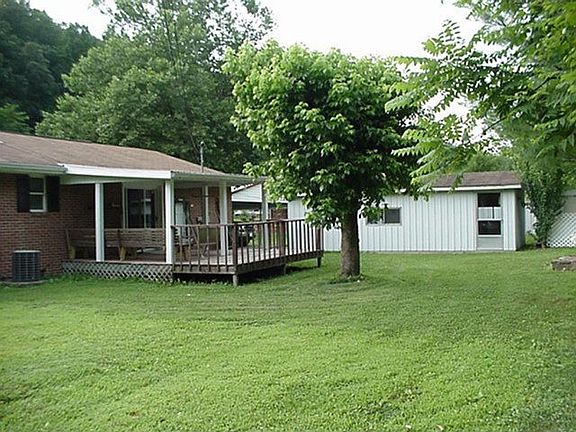 Back yard, deck , storage Bldg..
