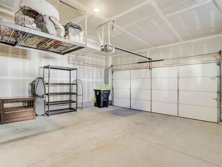 Garage
The attached 2-car garage, which includes an EV charger for easy travel.