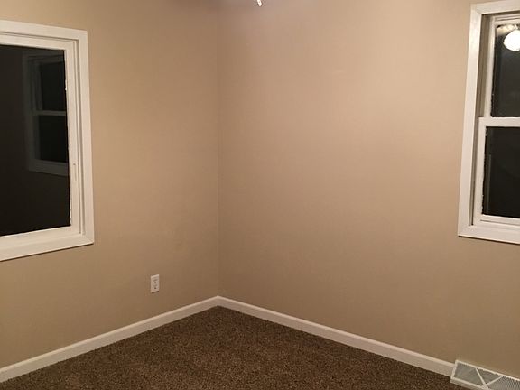 Master bed with ceiling fan