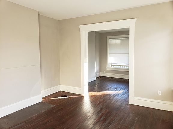 Dining and Living Room with Wood Floors