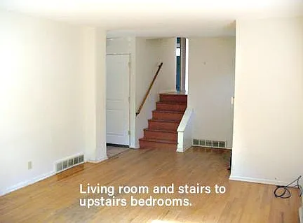 Living room and stairs to upstairs bedrooms.