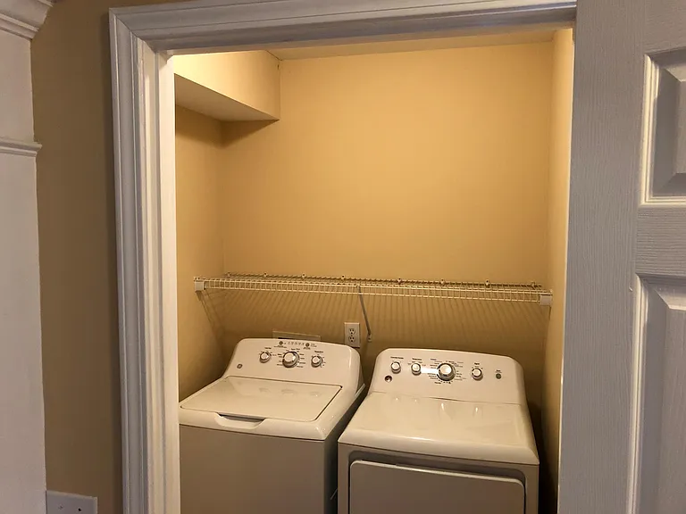 Spacious Laundry Room with Included Washer-Dryer