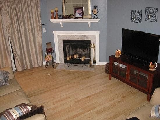 Main level family room with wood-burning fireplace