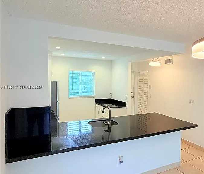 7740 Camino Real #G-303 — Photo 7