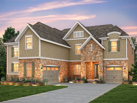 Stonegate Exterior 5 features stone, siding, shakes and covered front door