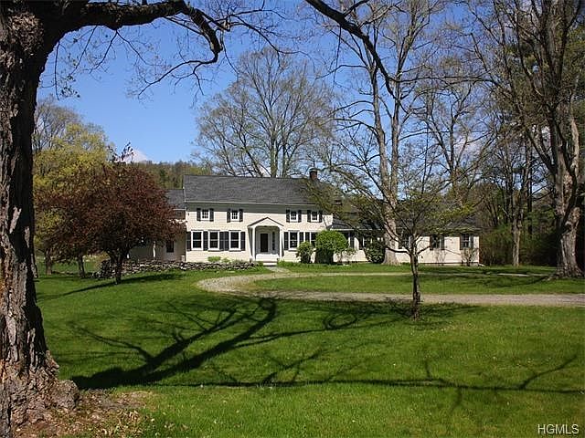 Quintessential 1800s American farmhouse privately sited on a total of 206 acres.