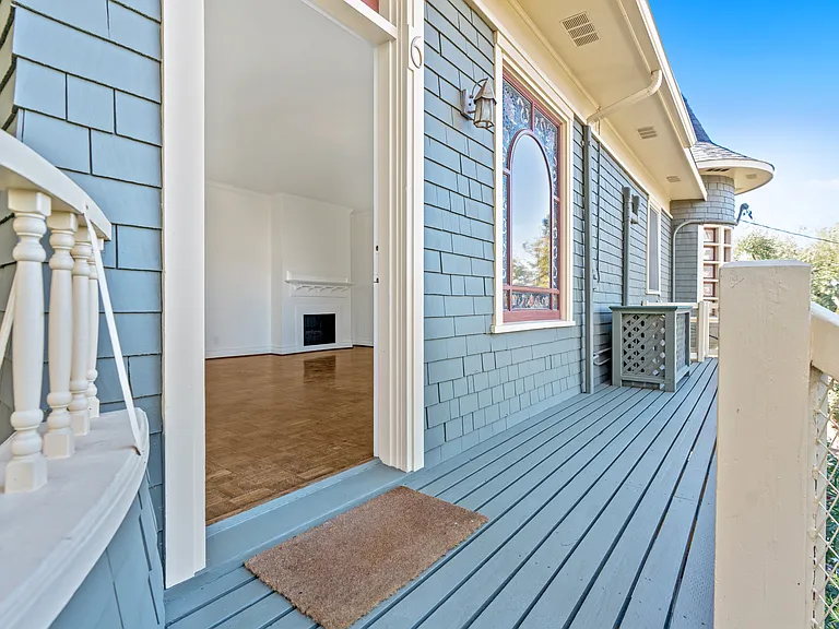 Apartment No. 6 entrance with private porch.