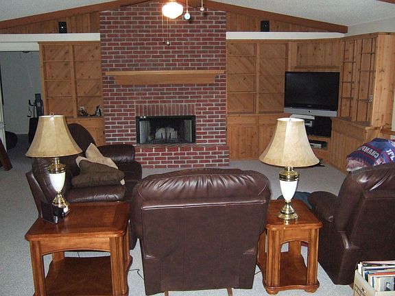 family room with bricked fireplace
