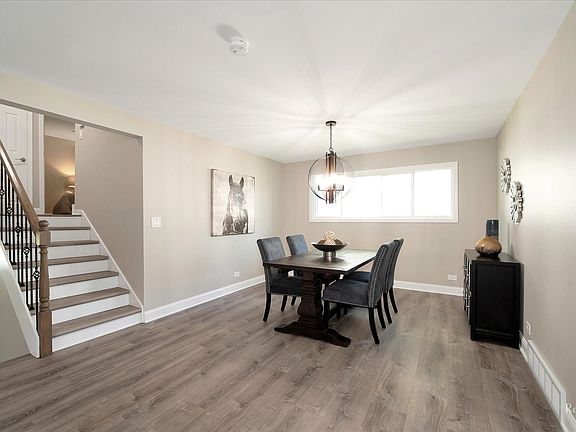 Formal Dining Room with views to your upper and lower level