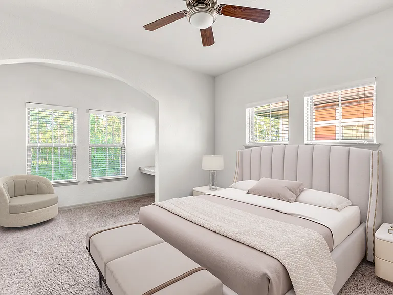Retreat to a bedroom built for relaxation.