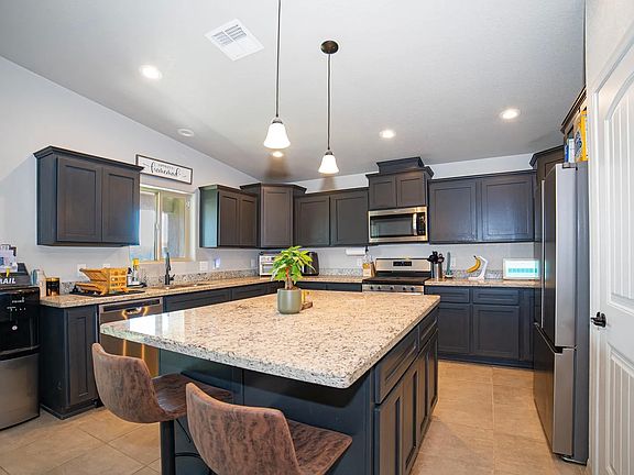 3rd image of 11573 E 33rd Ln