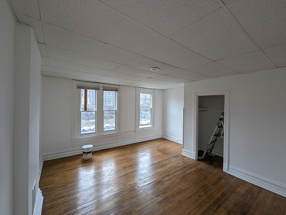 Bedroom is street facing with 4 windows and 1 closet