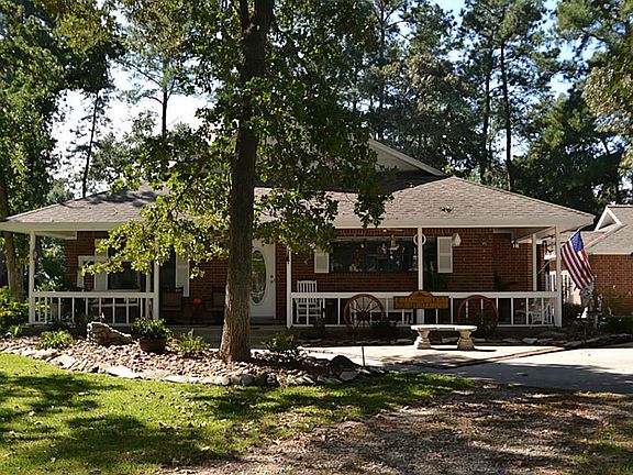 WRAP AROUND FRONT PORCH.