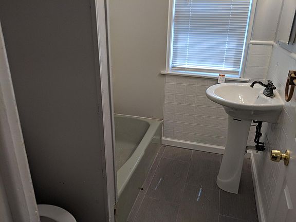 Full bath upstairs with tub