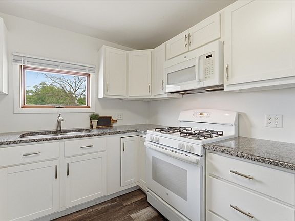 5th image of 3537 N Lewis Ave