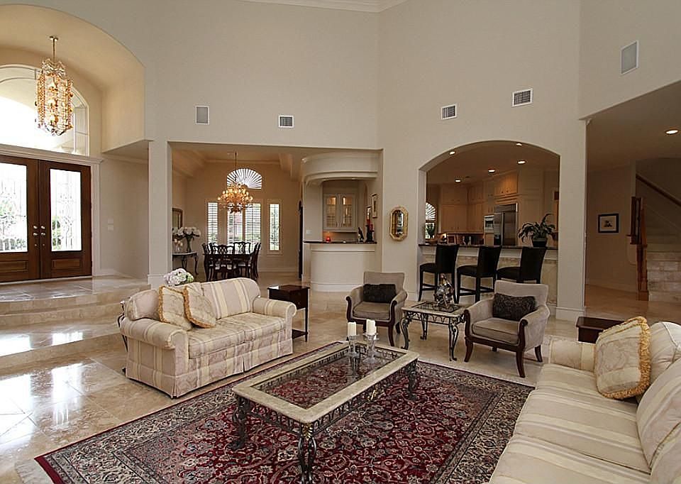 This view of the living room is taken from the large arched window.