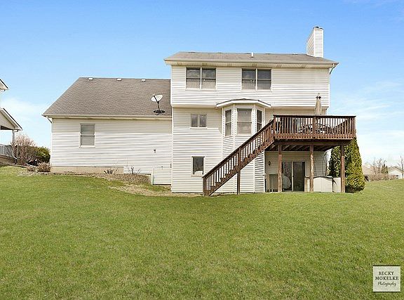 Enter the deck from the 1st floor of home & the patio from the walk-out basement~Both are perfect fo