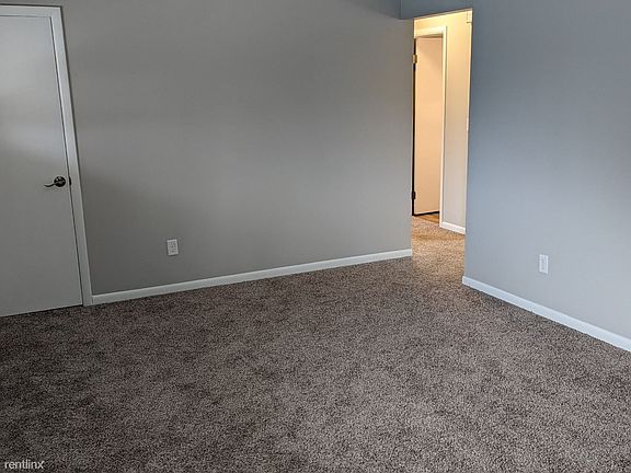 Living room with fresh carpet and paint