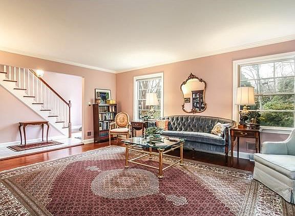 Elegant Living Room with crown moldings.