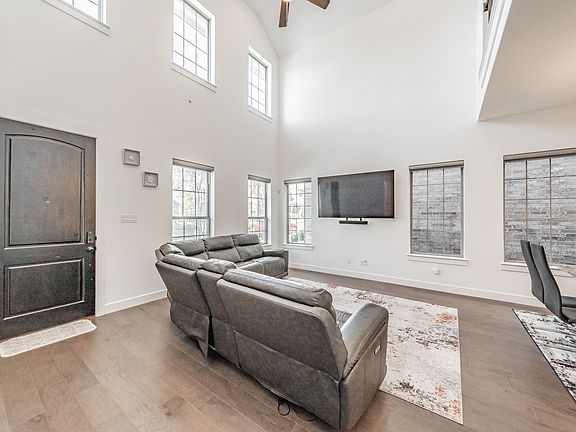 plenty of natural light and motorized blinds on lower level