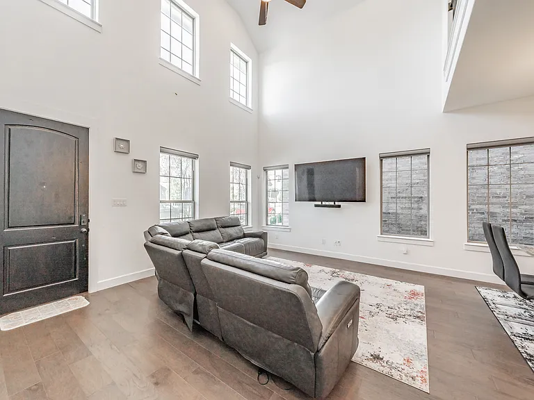 plenty of natural light and motorized blinds on lower level