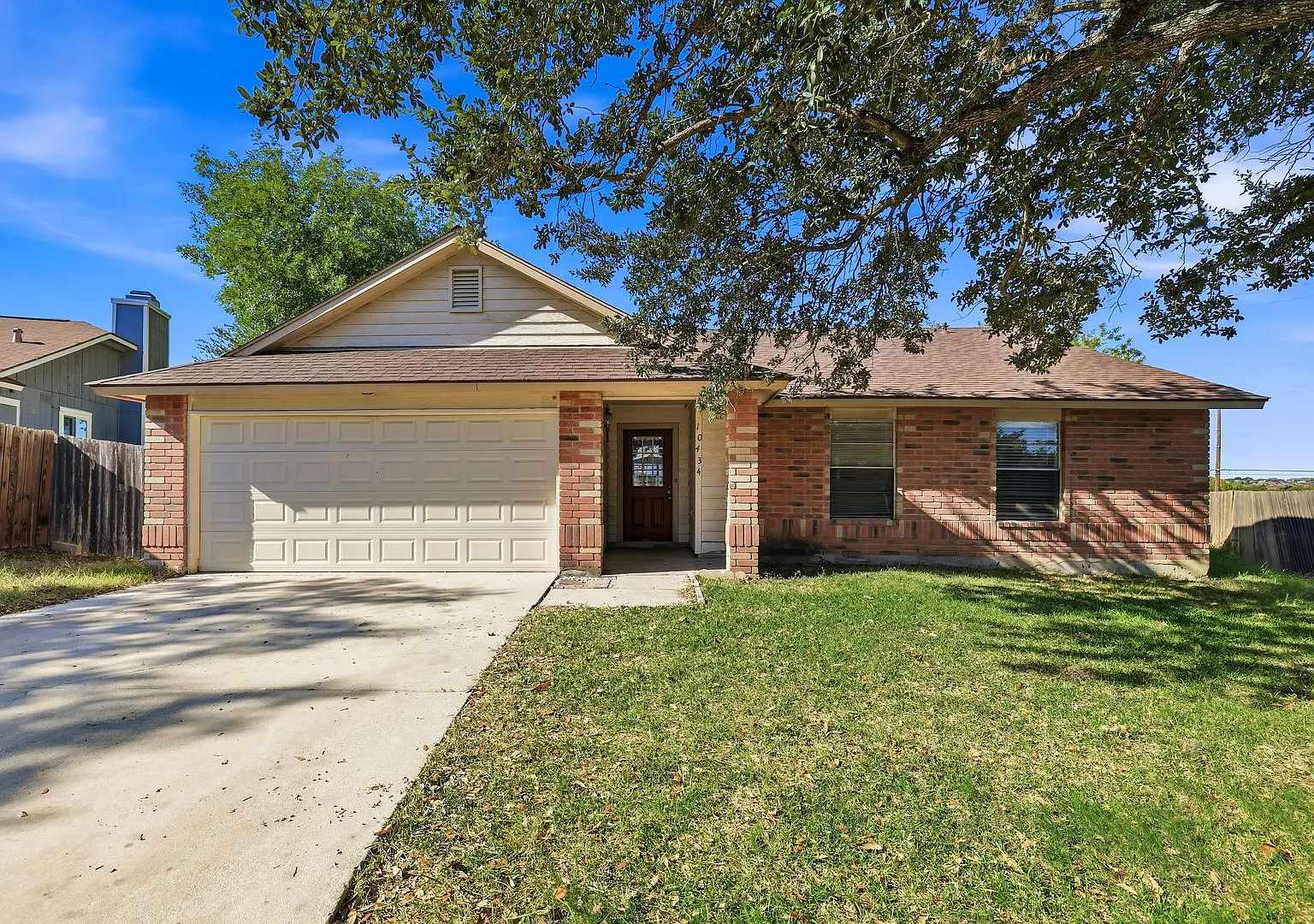 Beautiful Brick-Front Home with Spacious Living Areas & Private Backyard — Photo 1