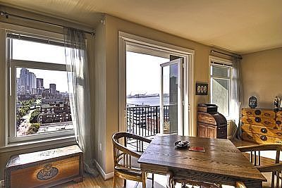 dinning room with french doors leading out to the deck