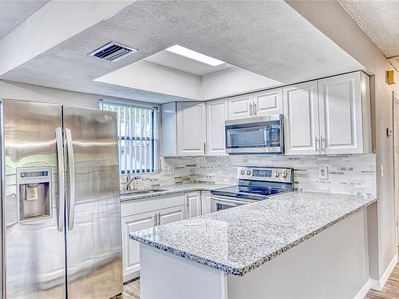 3rd image of 4975 91st Ave N APT C