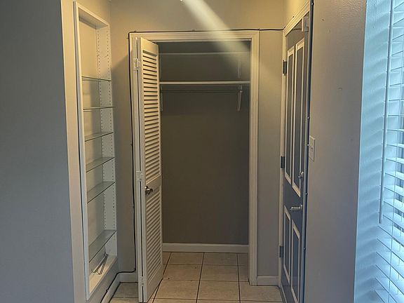 front door entry closet & display case