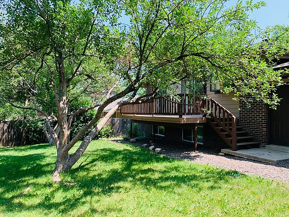 Backyard and deck. Garden level windows for lower level.