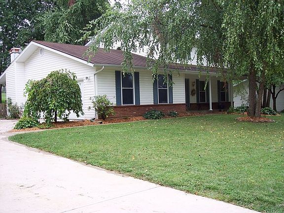 Side entry garage and front walk.