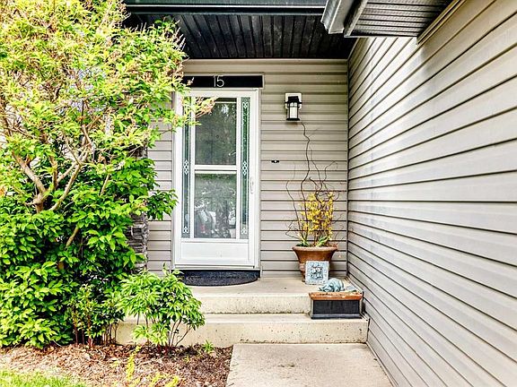 2nd image of 15 E Citadel Meadow Cres NW