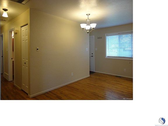 Nice open dining are next to kitchen, family room with a large window and access to the back yard.