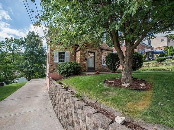 Enjoy a large driveway with 2 car garage.