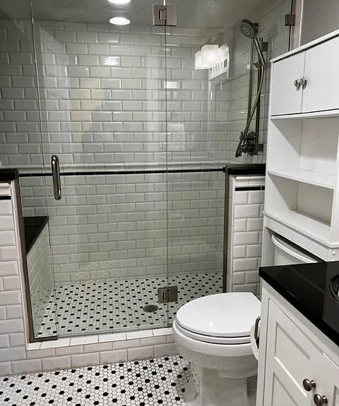 Shared bathroom on lower level.