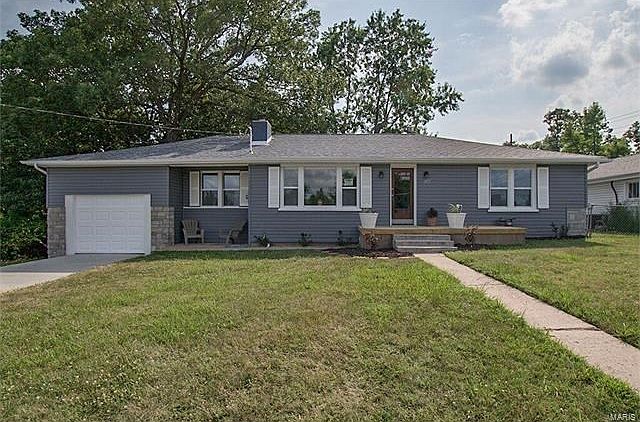 Welcome to 1853 Engle. New Roof, Siding, Window, Concrete Driveway and so much more.