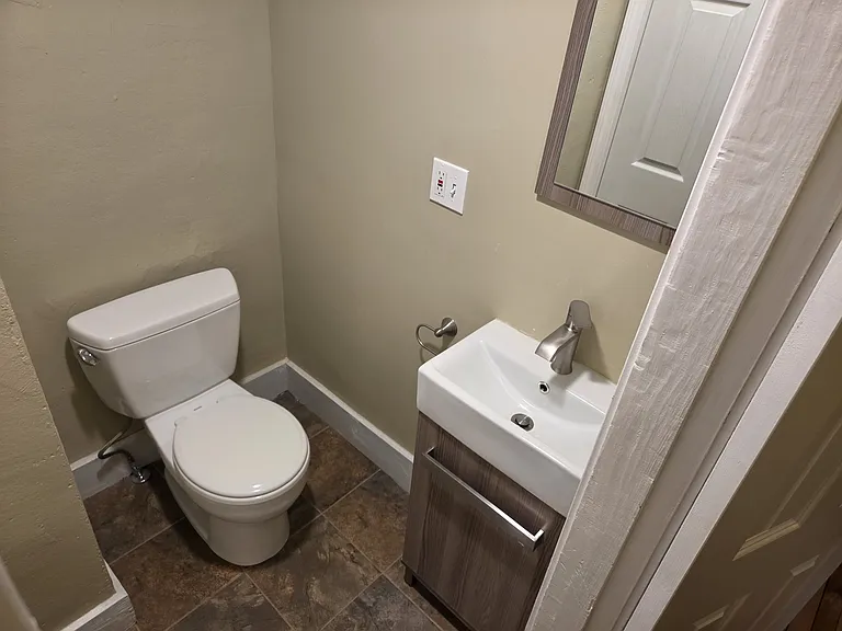 Updated half bathroom.