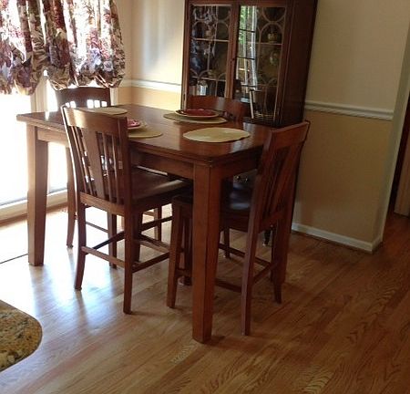 Breakfast area with hardwood floors