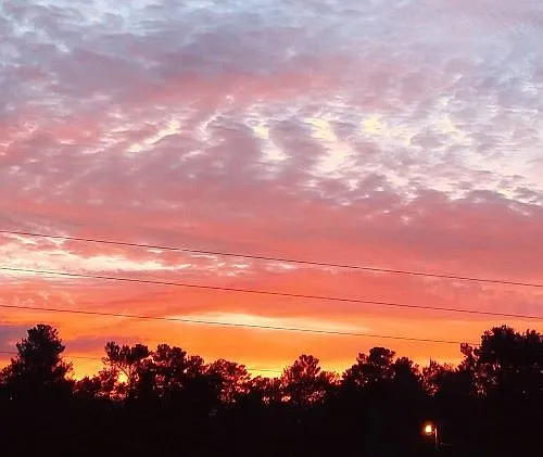 Sunrise 8039 Eastern Circle east facing hill top home view. Sip your coffee to this LIGHT show._