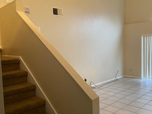 Stairs to 2nd Floor and main living room view