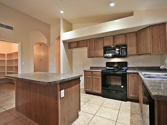 4th image of 13573 W Mauna Loa Ln