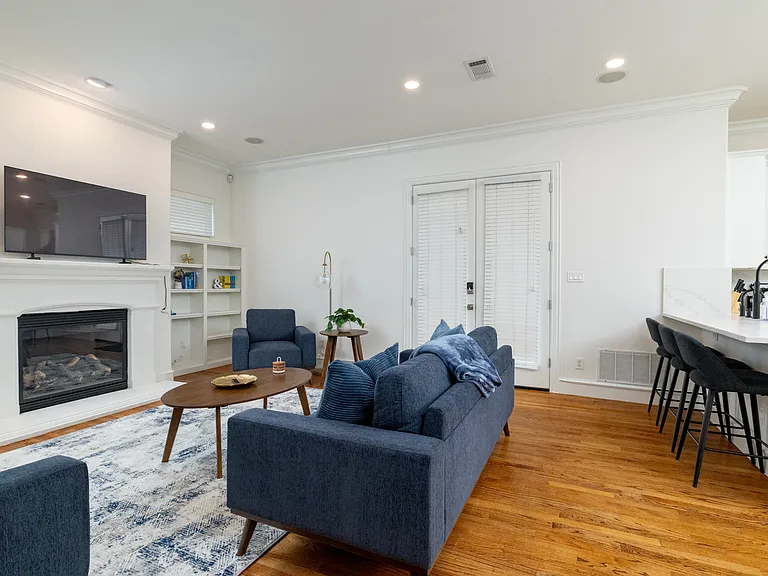 Bright, open-concept layout connecting the living and kitchen areas.