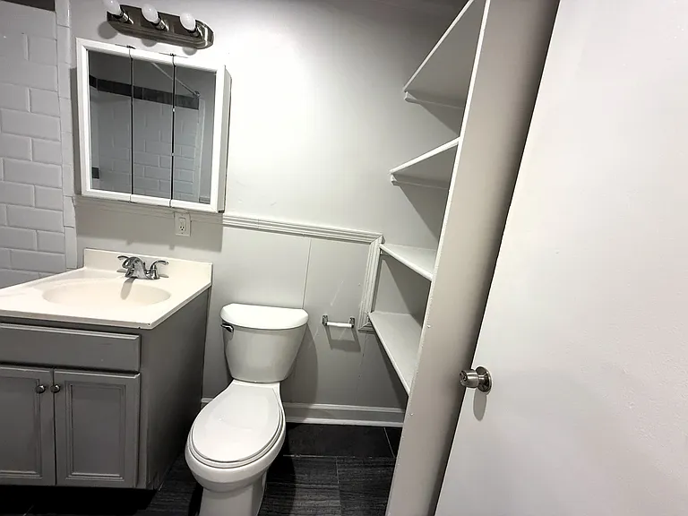 Full Bathroom with Shelf