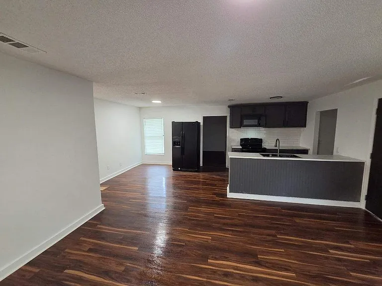 Living room, kitchen and dining space